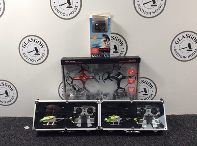 Lot 10 - 2 remote control helicopters and drone and sports camera