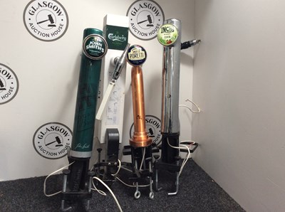 Lot 163 - Carlsberg,inch’s,poretti&john smiths beer pump-used
