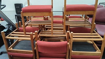 Lot 158 - 20 linkable chairs in red fabric with wooden shelf underneath from a church RRP £50 each