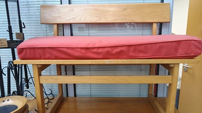 Lot 171 - Small wooden bench with red cushion