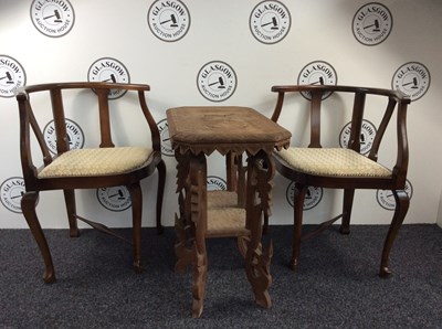 Lot 261 - Two Wooden Corner Chairs & A Hand Carved Wooden Table - Used