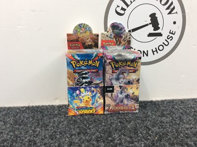 Lot 100 - 2x Small Boxes of Pokemon cards packets have been opened