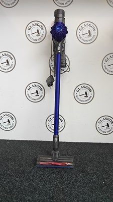 Lot 153 - Dyson cordless vacuum with charger and mount