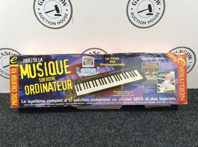 Lot 239 - Music creator 49 evolution system midi keyboard