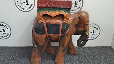 Lot 178 - Wooden carved and painted elephant side table
