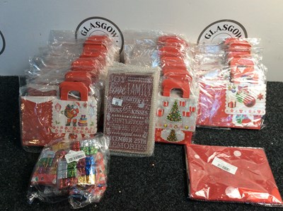 Lot 33 - Approximately 26 Christmas Gift Bags 12 Per Pack, 4 Wooden Plaques, A Qty of Mini Present Decorations & Large Christmas Flag - Mixed