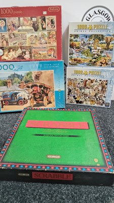Lot 157 - Bag containing jigsaw puzzles and Scrabble