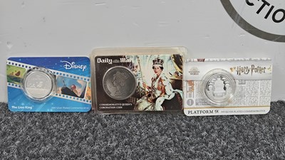 Lot 57 - 3 collectable coins in mounted on card
