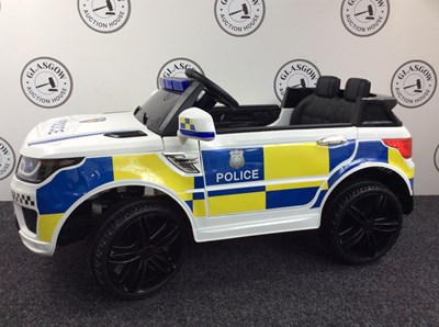 Lot 130 - Children’s Ride On Police Car with Charger 43” L, 20” W, 21” H - New
