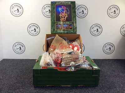 Lot 47 - Qty of Christmas Decorations & Wrapping Materials, 24 Tree Skirts, 4 Bags Of Gift Bags, Two Packs Of 4 Stockings, Ten Tin Foil Curtains, Nine Wall Decorations & More - New