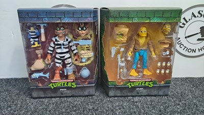 Lot 201 - 2 teenage mutant turtles action figure sets in display boxes