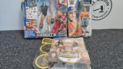 Lot 205 - 3 wrestling action figures in display box