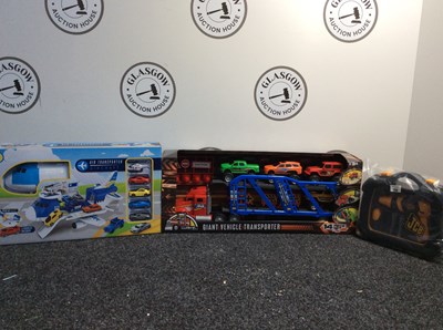 Lot 184 - Three Kids Toys, Including JCB Toolkit, Air Transporter Aircraft & Giant Vehicle Transporte 14pcs - New