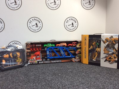 Lot 22 - Three Kids Toys, Including Morph Droid Bot, JCB Toolkit & Giant Vehicle Transporter Truck 14pcs - New