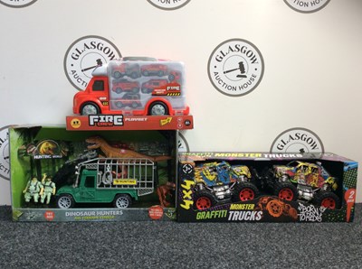 Lot 20 - Three Kids Toys, Including Dinosaur Hunter All Terrain Vehicles, Firecrew Playset & Graffiti Monster Trucks - New