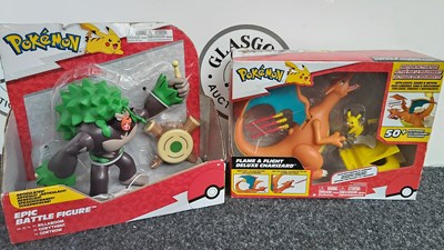 Lot 43 - 2 Pokémon toys. Epic battle figure and charizard