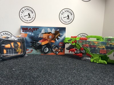 Lot 122 - Three Kids Toys, Including JCB Toolkit, Dino Transporter Kit & Beast Bricks Vehicle Set - New