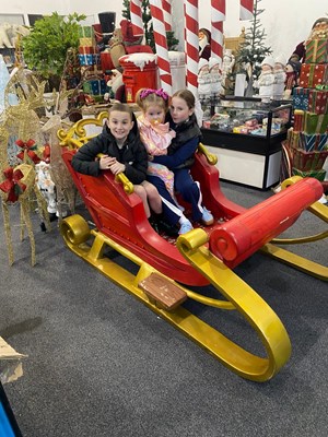 Lot 281 - Large 2 person red and gold sleigh ideal for photos / display