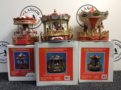 Lot 14 - 3 Christmas Carousel Scene Decorations With Multi Colour LED Lights Varying Sizes - New