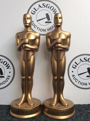 Lot 10 - 2 small oscar style statues and decorative "gone with the wind" film reel case