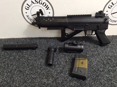 Lot 44 - Prop air soft collapsible stock assault rifle with scope, silencer and forward grip