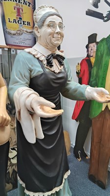 Lot 62 - Traditional serving old lady in maid outfit approx 5'10" tall