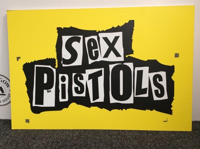 Lot 92 - Sex pistols prop advertising sign 90cm x 60cm