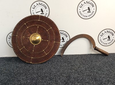 Lot 85 - Traditional style round shield with padded grip and scythe