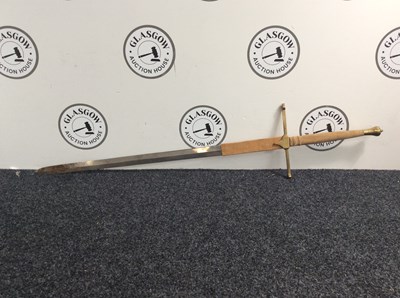 Lot 102 - Decorative style long sword with leather hilt