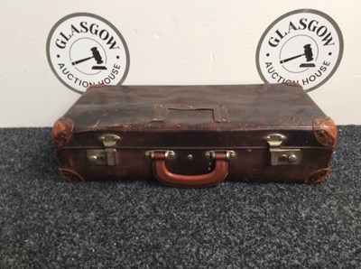 Lot 106 - Traditional style small case with wear consistent with age