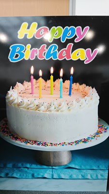 Lot 115 - Large happy birthday prop cake sign