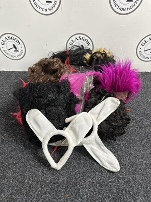 Lot 166 - Box of wigs and feathers