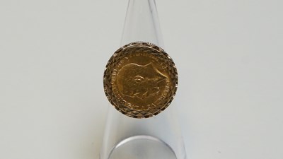 Lot 28 - Full gold sovereign ring 12.81 gram