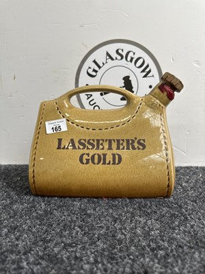 Lot 165 - Lasseter's Gold whisky decanter in shape of bag