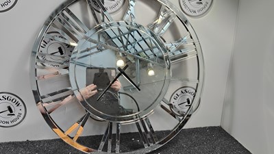 Lot 154 - Large mirror clock with cut out details - Used