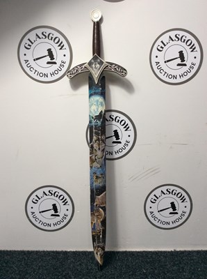 Lot 134 - Three wolf moon novelty decorative sword.
