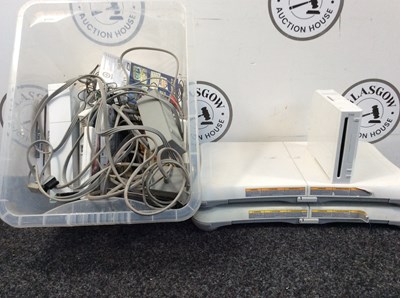 Lot 171 - Wii bundle with games controllers and fit boreds..
