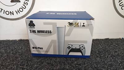 Lot 104 - 2.4G Wireless Game Stick Pro Mini Console With 2 Controller New