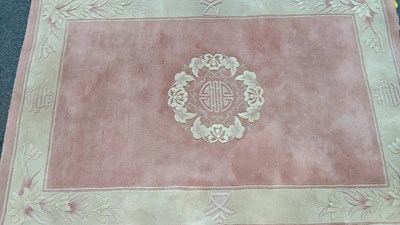 Lot 65 - Traditional style pink rug