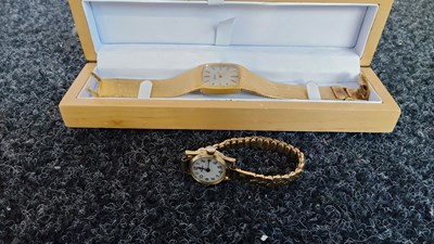 Lot 150 - 2 ladies wrist watches one in wooden display box