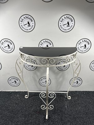 Lot 261 - White metal framed console table with black glass top 30” Tall