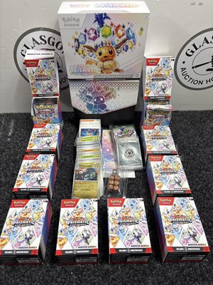 Lot 69 - 10 Scarlet & Violet Prismatic Evolutions Booster Display (6 Booster Packs Per Box) & 1 Prismatic Evolutions Elite Trainer Box inc 6 Booster Packs & Players Guide Book *All Packs Open* - Used