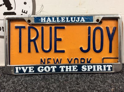 Lot 98 - New York “True Joy” License Plate With Plate Holder - Used