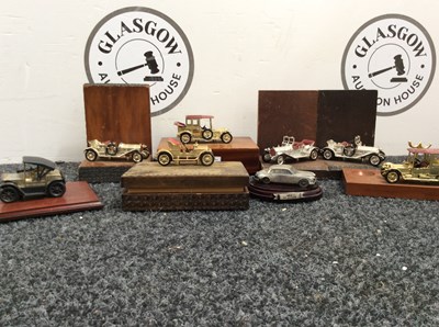 Lot 73 - Large qty of wooden plinth mounted vehicles