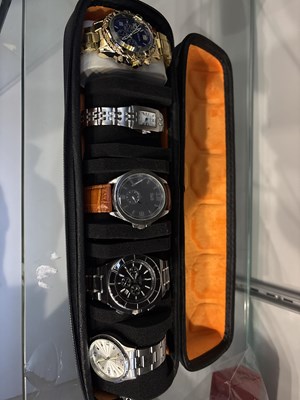 Lot 64 - 6 watches in carry case