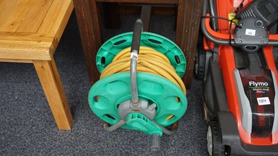Lot 299 - Garden Hose & Reel