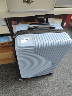 Lot 333 - Blue Suitcase on Wheels