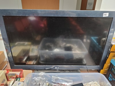 Lot 22 - LG TV with remote