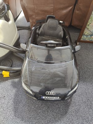 Lot 270 - Audi black kids ride on car no charger