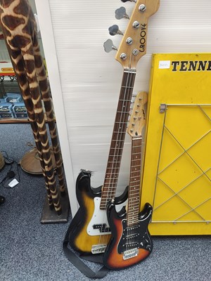 Lot 136 - Bass guitar and electric guitar